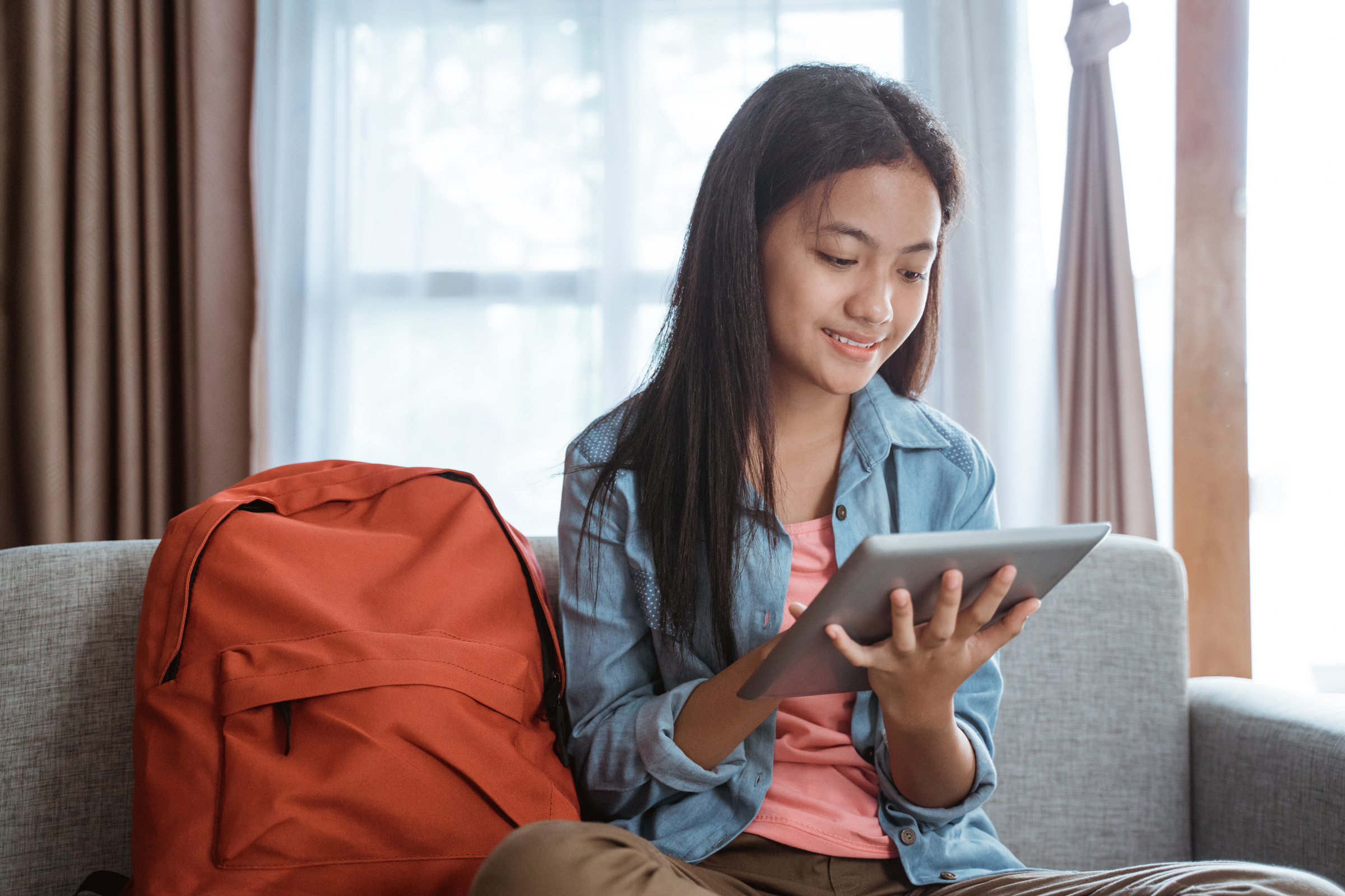 Smile Young Teen Using Tablet Pc